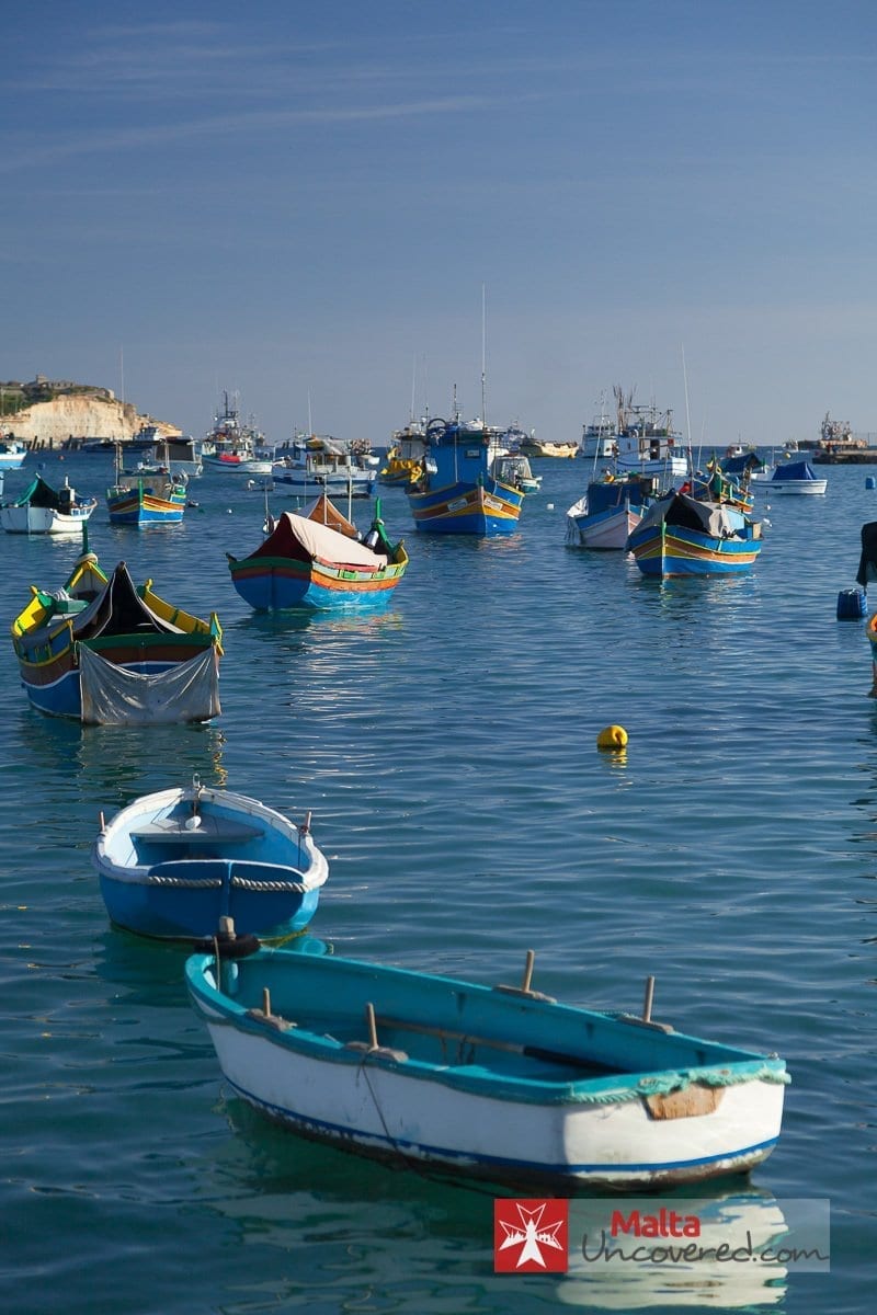 Fishing boats in the harbor of the beatiful malta city