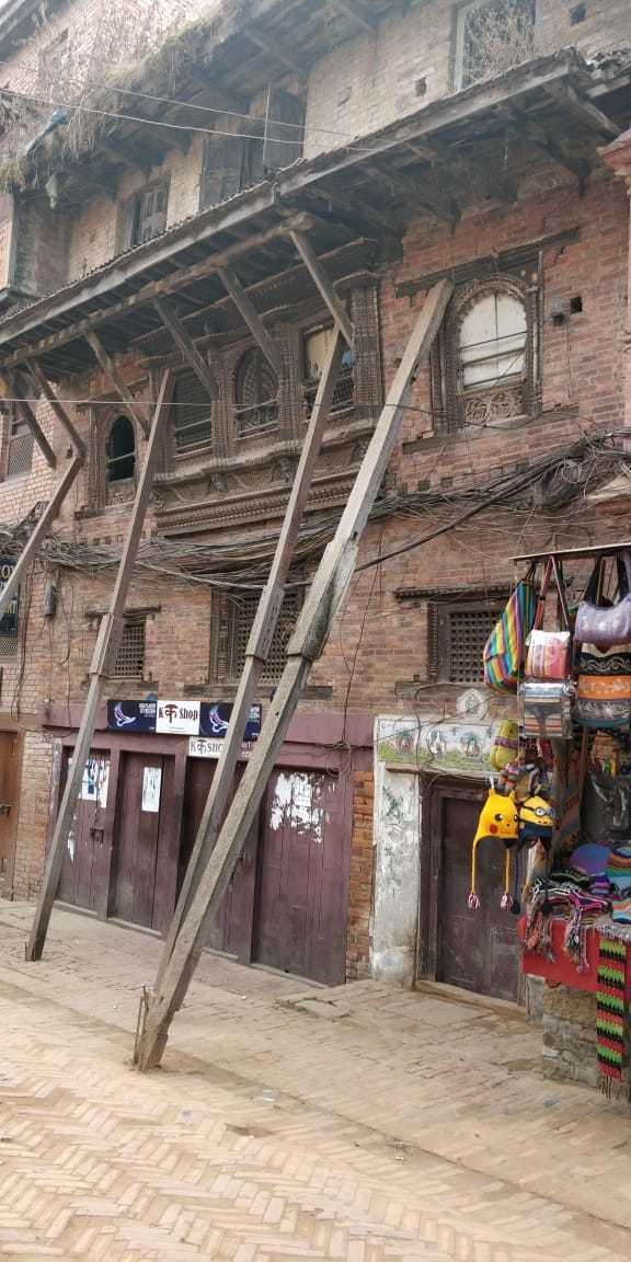 About nepal - wood beams holding up homes and businesses